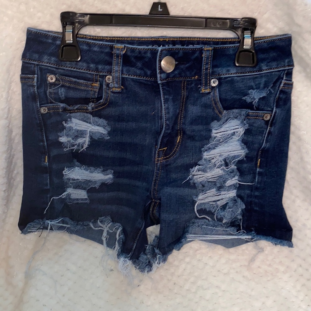 Distressed denim shorts